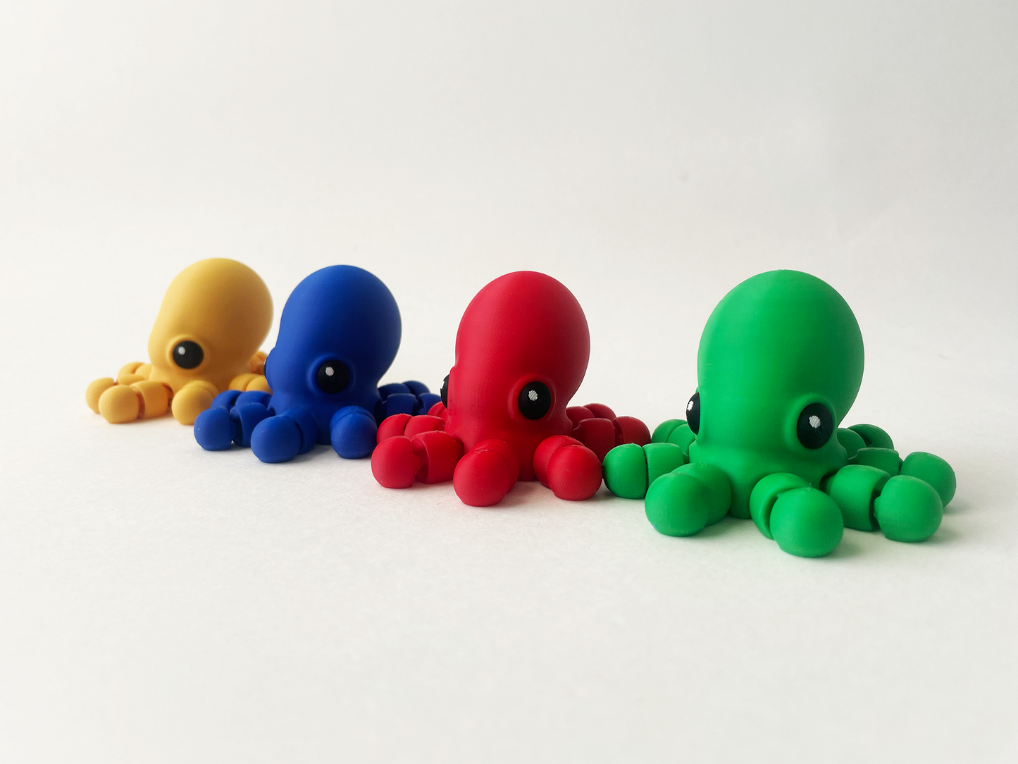 Set of 4 Baby Multi-Colored Octopuses-- Red, Green, Yellow & Blue for Fun Marine Animal Pretend Play and Tactile STEM Learning