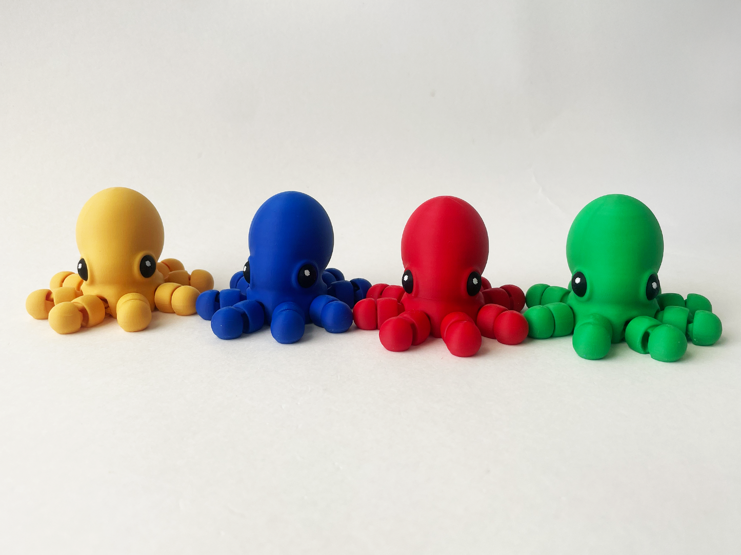 Set of 4 Baby Multi-Colored Octopuses-- Red, Green, Yellow & Blue for Fun Marine Animal Pretend Play and Tactile STEM Learning