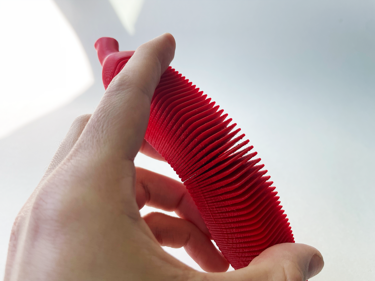 Red Dacca Flexi Banana Fidget Toy for Pretend Tactile STEM Play