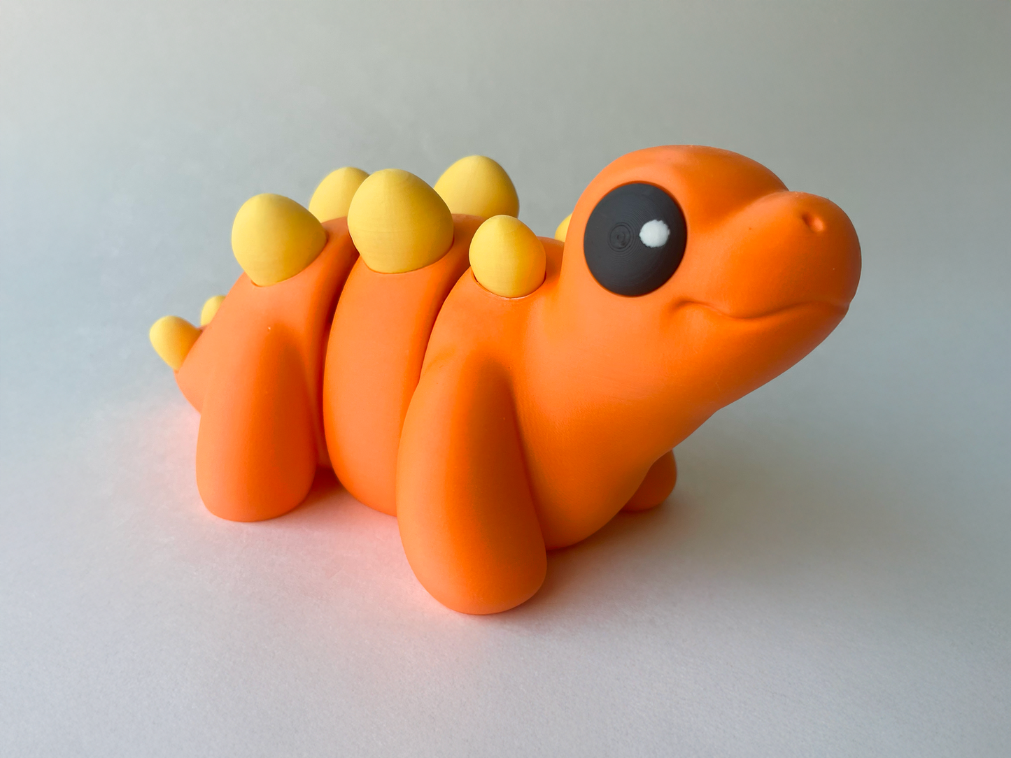 Orange Stegosaurus Dinosaur Flexi Toy Figurine for STEM Learning Play!