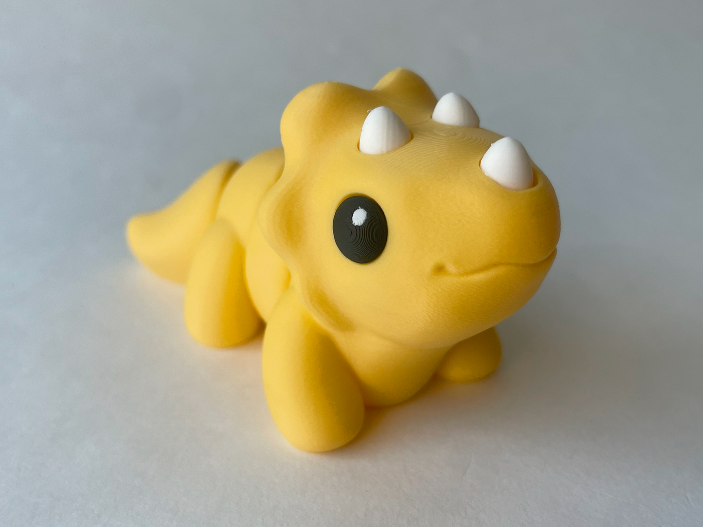 Sunny Yellow Triceratops Dinosaur Flexi Toy Figurine for Tactile Learning Play!