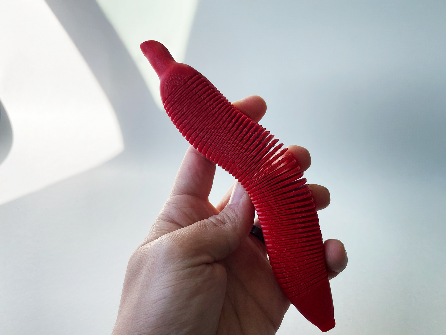 Red Dacca Flexi Banana Fidget Toy for Pretend Tactile STEM Play