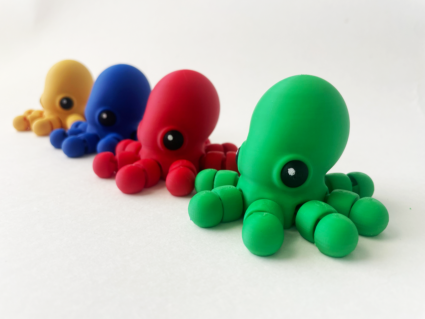 Set of 4 Baby Multi-Colored Octopuses-- Red, Green, Yellow & Blue for Fun Marine Animal Pretend Play and Tactile STEM Learning