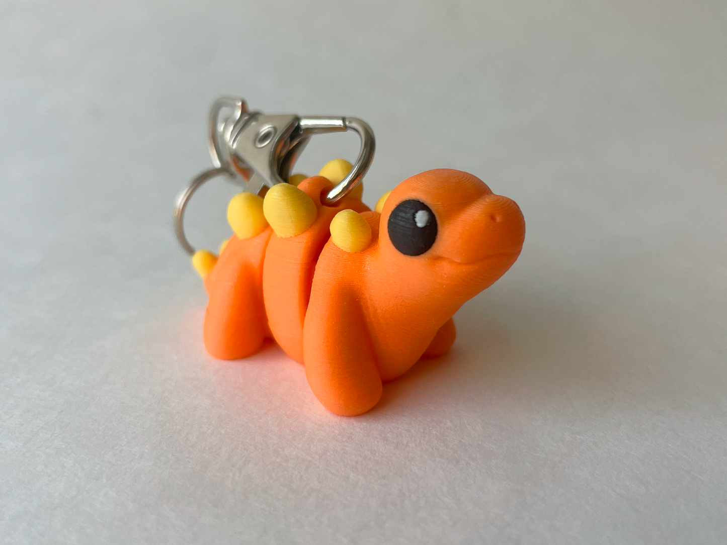 Orange Stegosaurus Dinosaur Flexi Toy Figurine for STEM Learning Play!