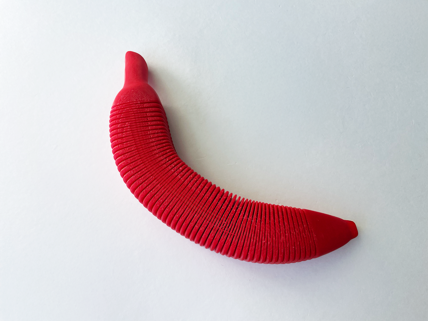 Red Dacca Flexi Banana Fidget Toy for Pretend Tactile STEM Play