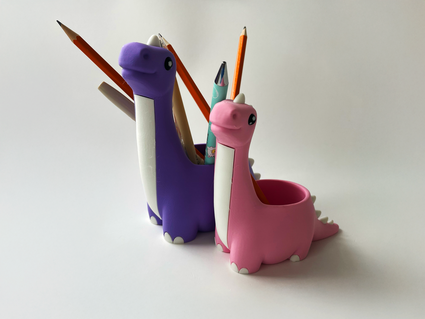 Dino Pencil Holders! (Set of 2, Purple Dad and Pink Mom Dinos)
