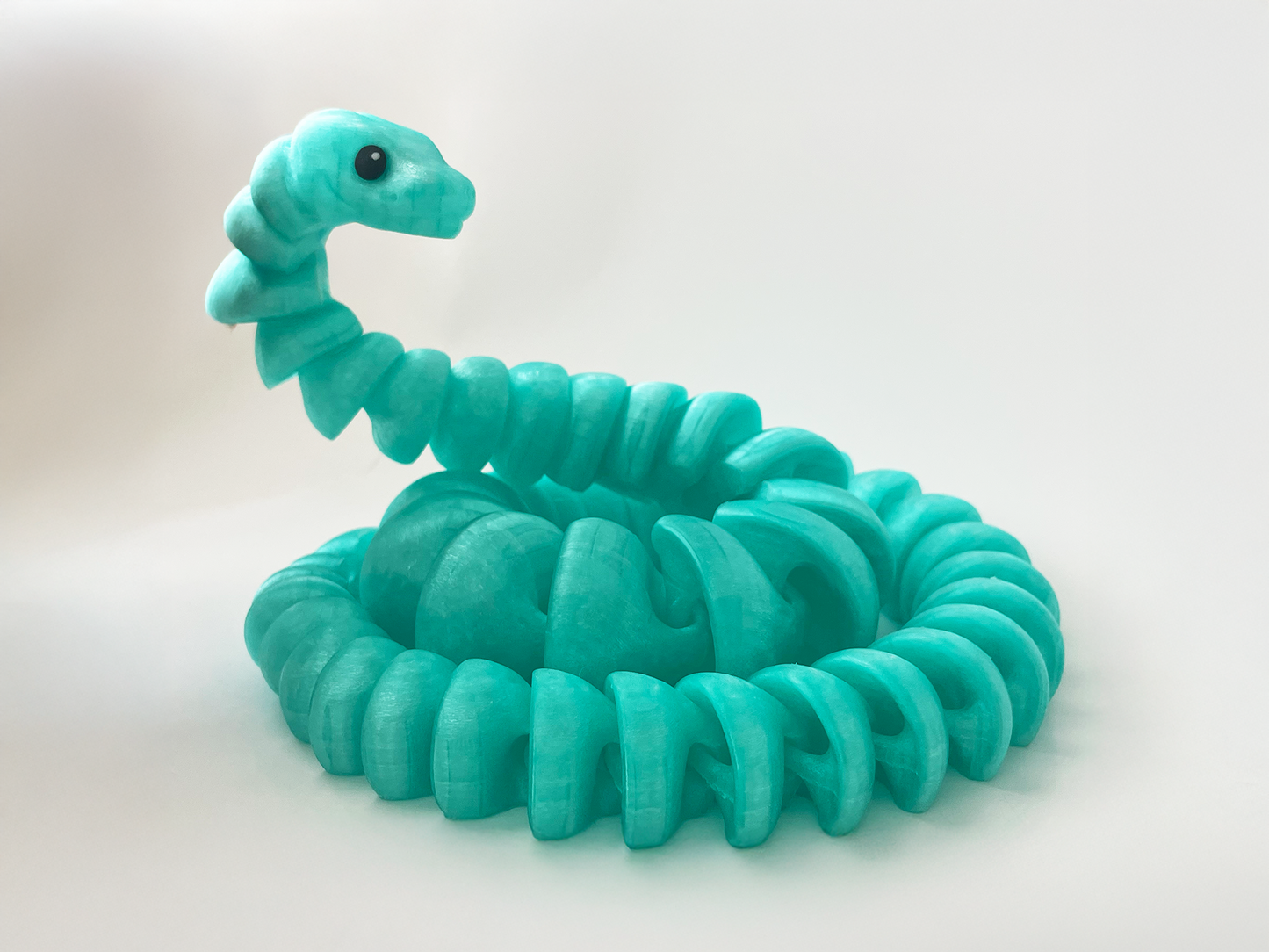 ZOU's Large Translucent Teal Boa Snake Toy - High-Quality 3D-Printed Articulated Buddy with Tiki-Taka Noise for Indoor and Outdoor Play