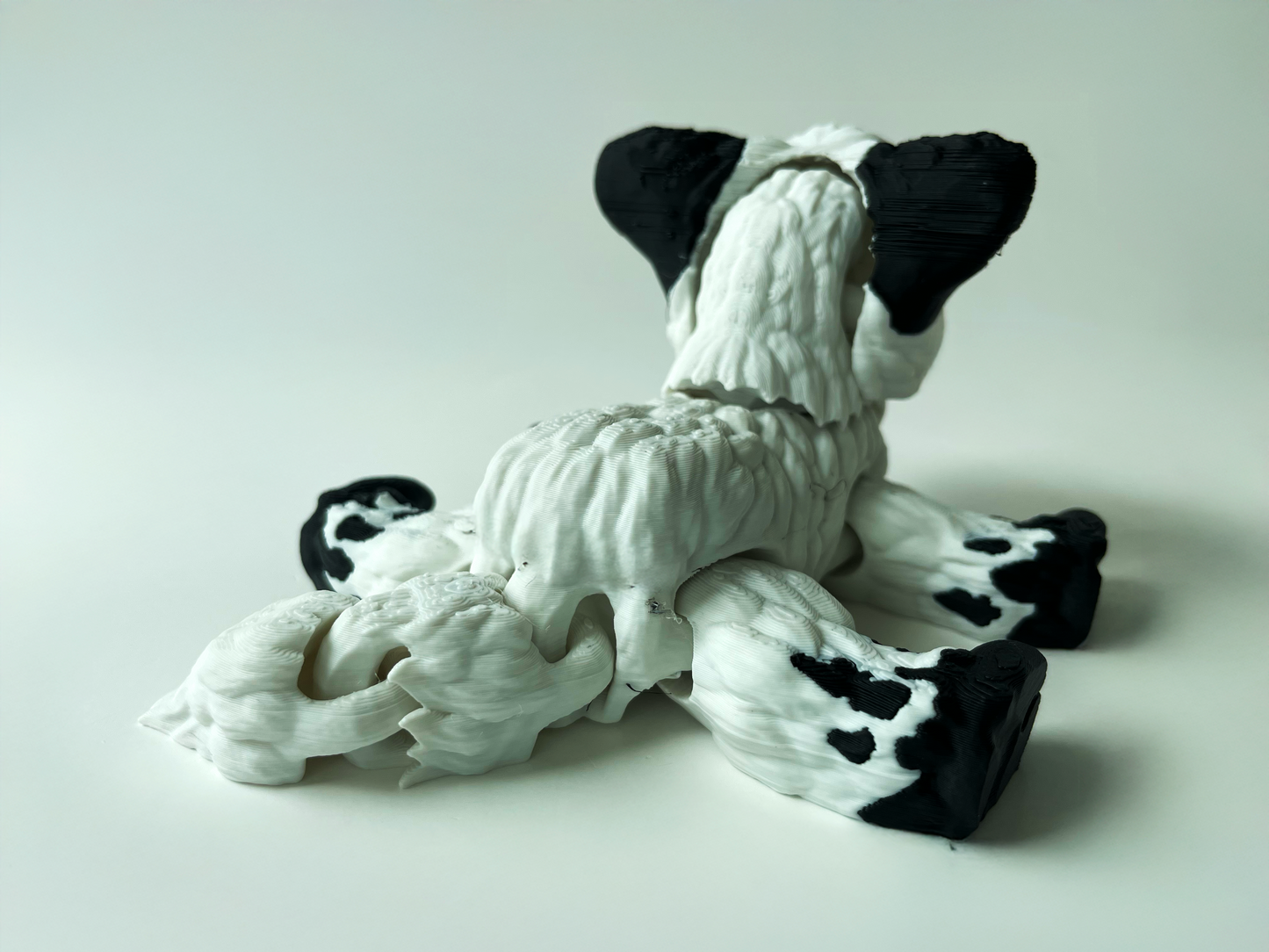 Daisy, the Black & White Posable Mountain Cow