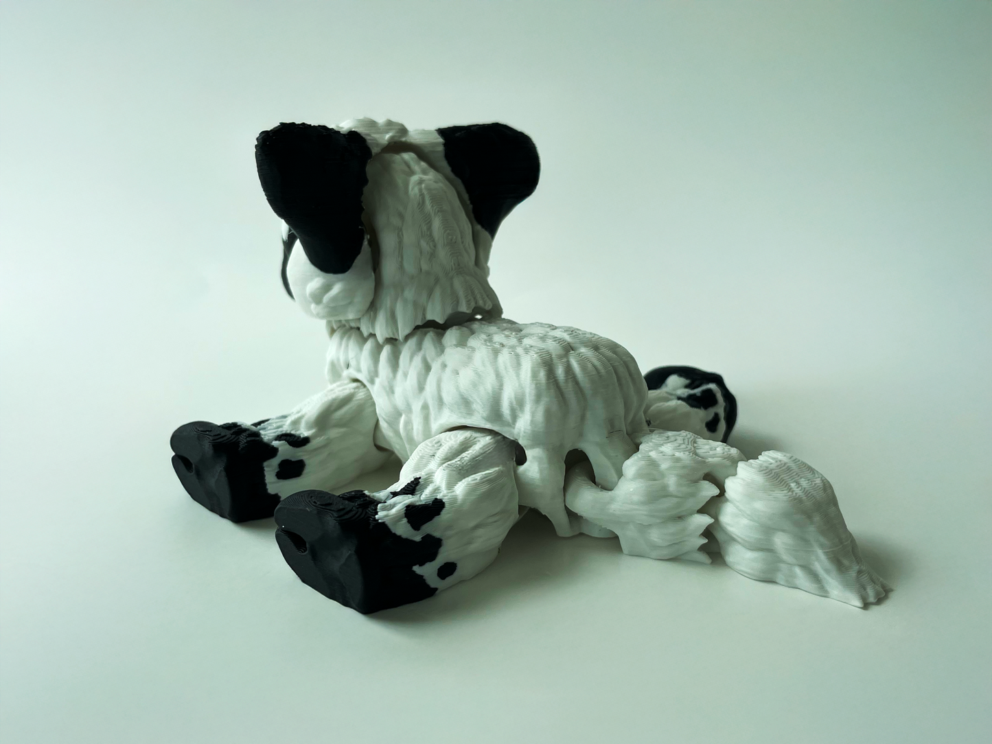 Daisy, the Black & White Posable Mountain Cow