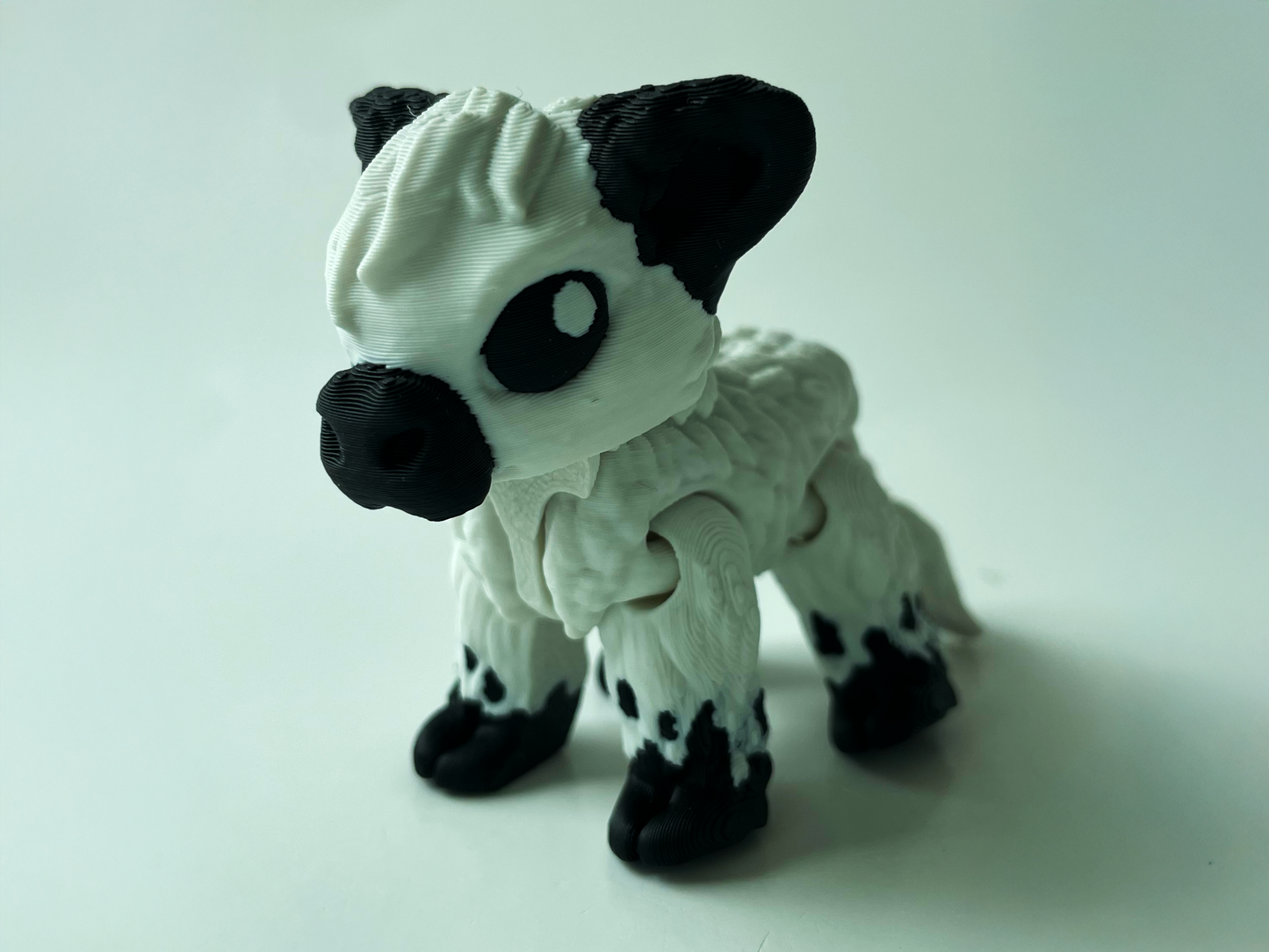 Daisy, the Black & White Posable Mountain Cow