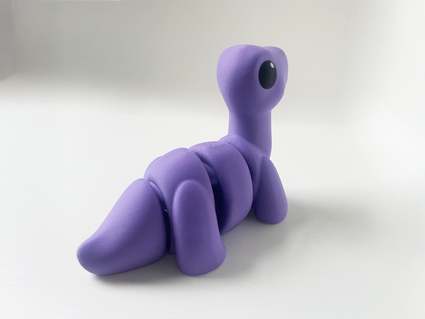 ZOU's Baby Purple Brontosaurus Fidget Toy - High-Quality 3D Printed Articulated Brontosaurus Dinosaur for Indoor & Outdoor Stress Relief Play (Copy)