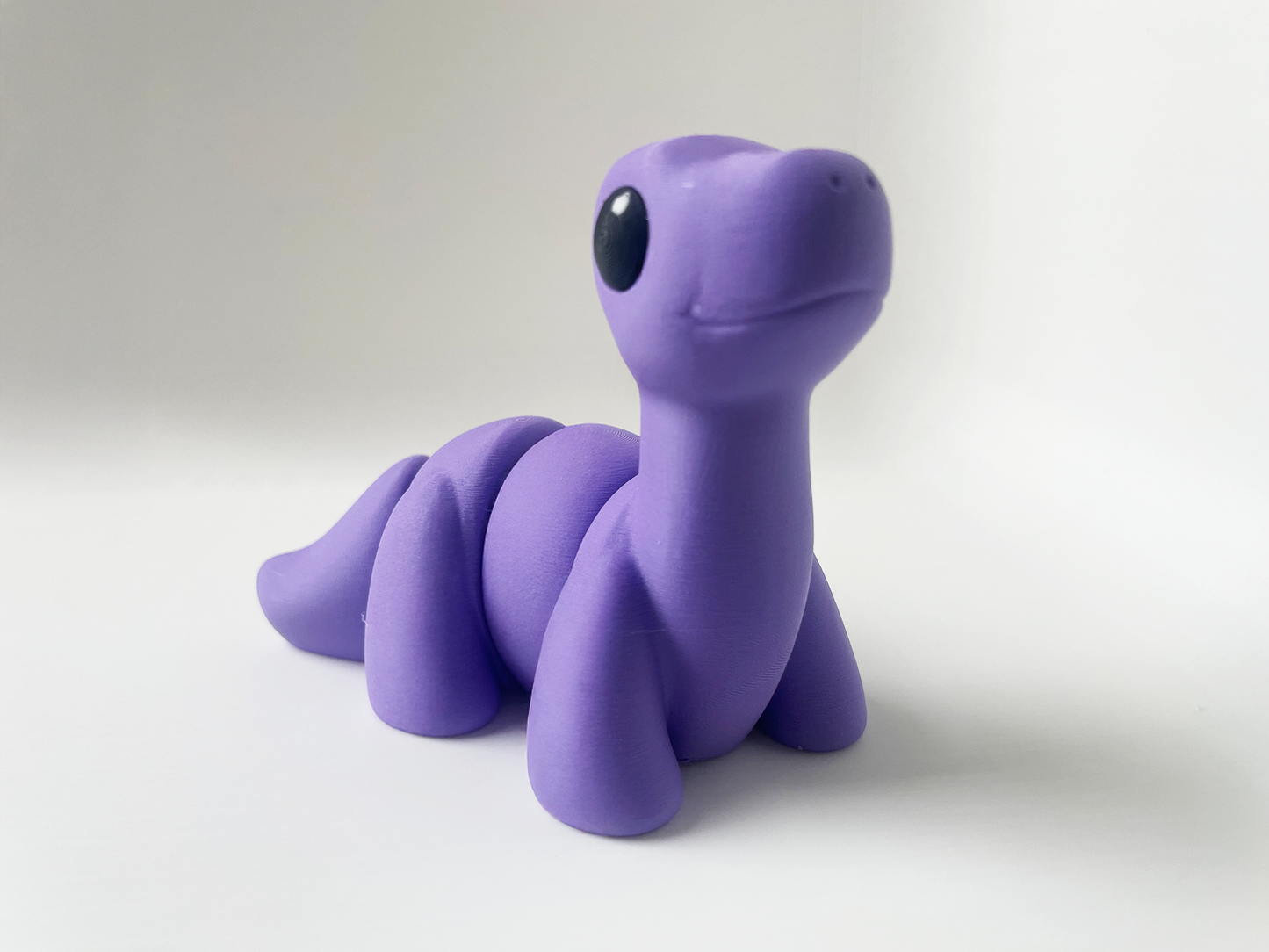 ZOU's Baby Purple Brontosaurus Fidget Toy - High-Quality 3D Printed Articulated Brontosaurus Dinosaur for Indoor & Outdoor Stress Relief Play (Copy)