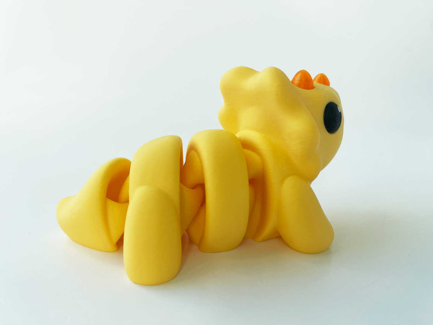 ZOU's Baby Yellow Triceratops Dino Fidget Toy - High-Quality 3D Printed Articulated Dinosaur for Indoor & Outdoor & Stress Relief Play