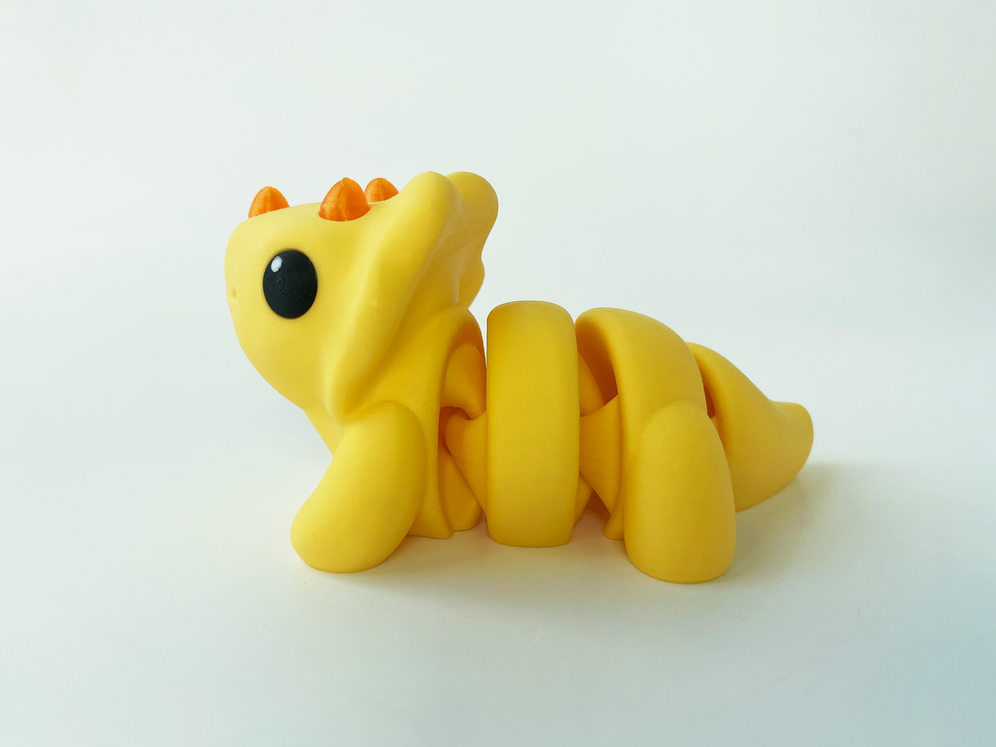 ZOU's Baby Yellow Triceratops Dino Fidget Toy - High-Quality 3D Printed Articulated Dinosaur for Indoor & Outdoor & Stress Relief Play