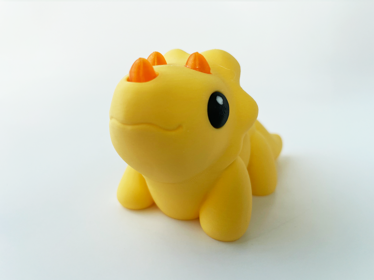 ZOU's Baby Yellow Triceratops Dino Fidget Toy - High-Quality 3D Printed Articulated Dinosaur for Indoor & Outdoor & Stress Relief Play