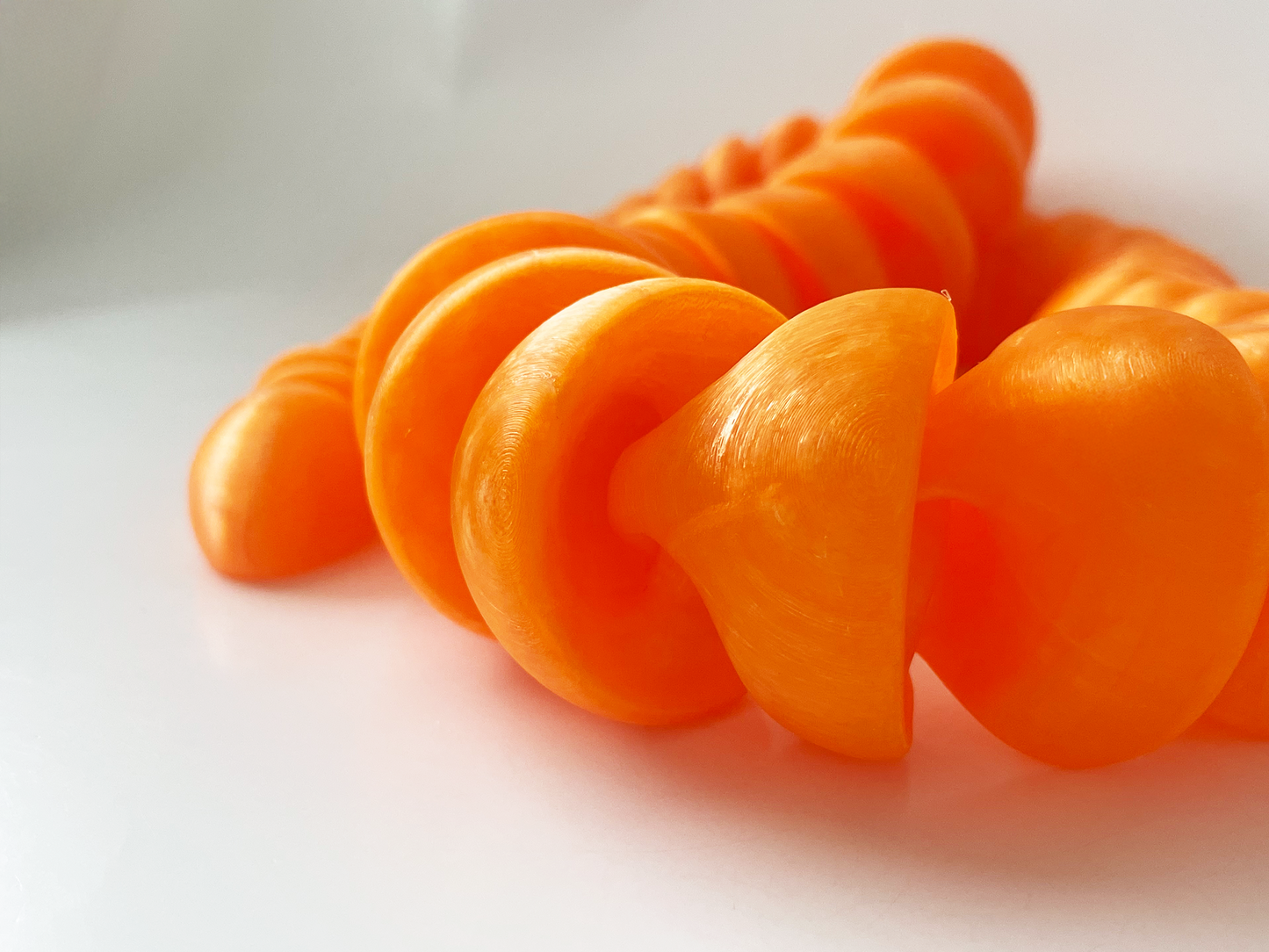 ZOU's Large Translucent Orange Boa Snake Toy - High-Quality 3D-Printed Articulated Buddy with Tiki-Taka Noise for Indoor and Outdoor Play
