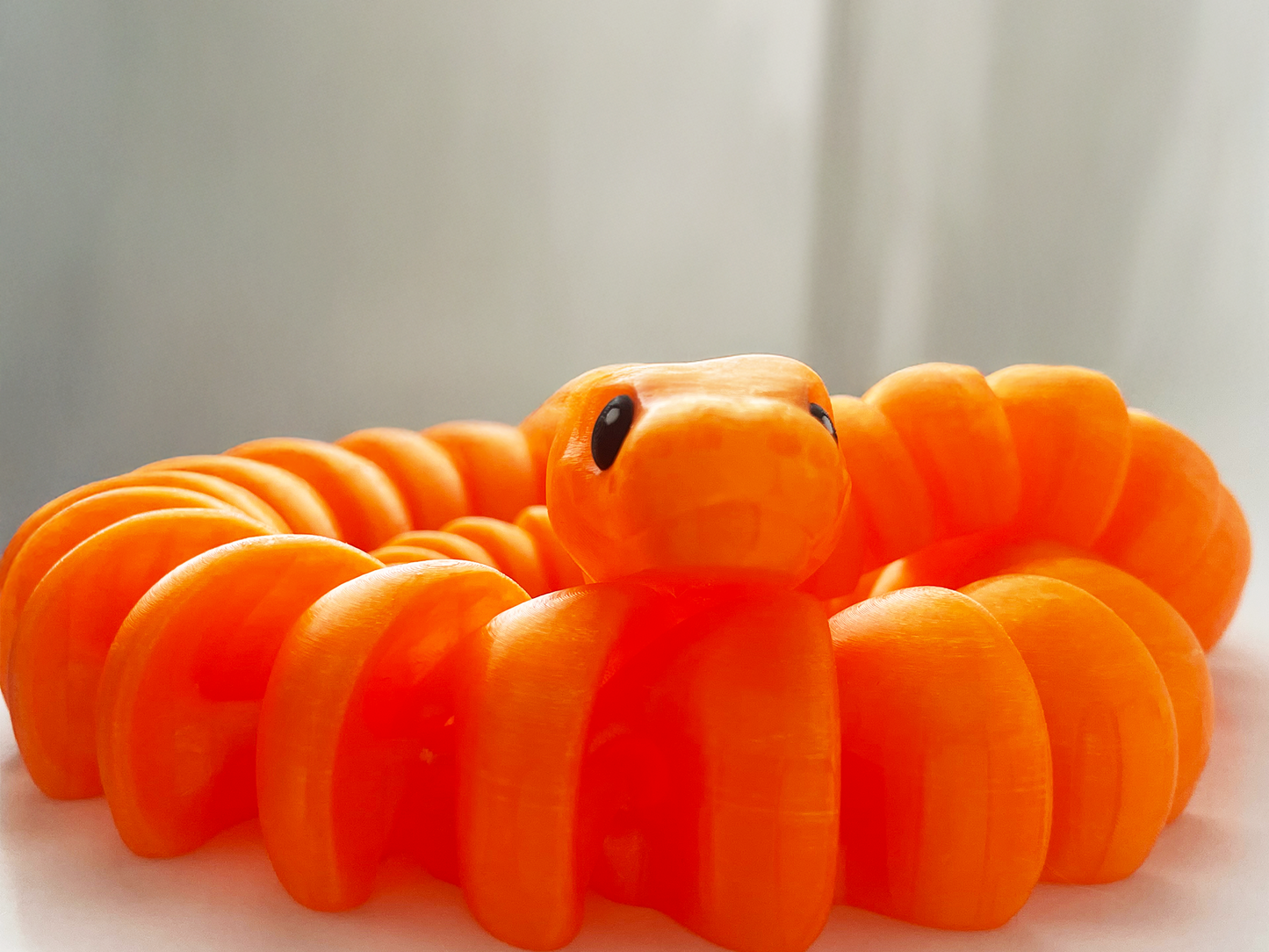ZOU's Large Translucent Orange Boa Snake Toy - High-Quality 3D-Printed Articulated Buddy with Tiki-Taka Noise for Indoor and Outdoor Play