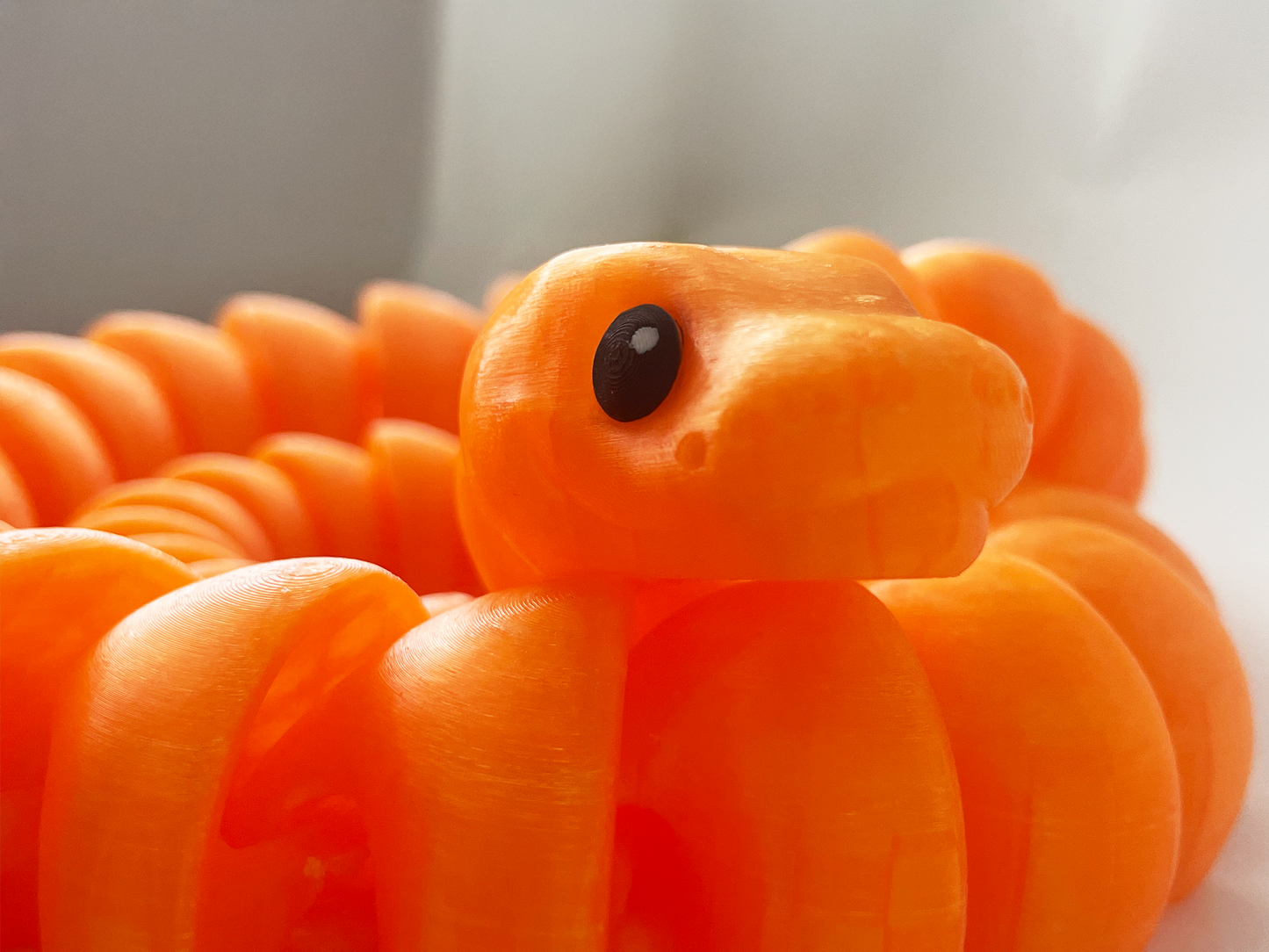 ZOU's Large Translucent Orange Boa Snake Toy - High-Quality 3D-Printed Articulated Buddy with Tiki-Taka Noise for Indoor and Outdoor Play