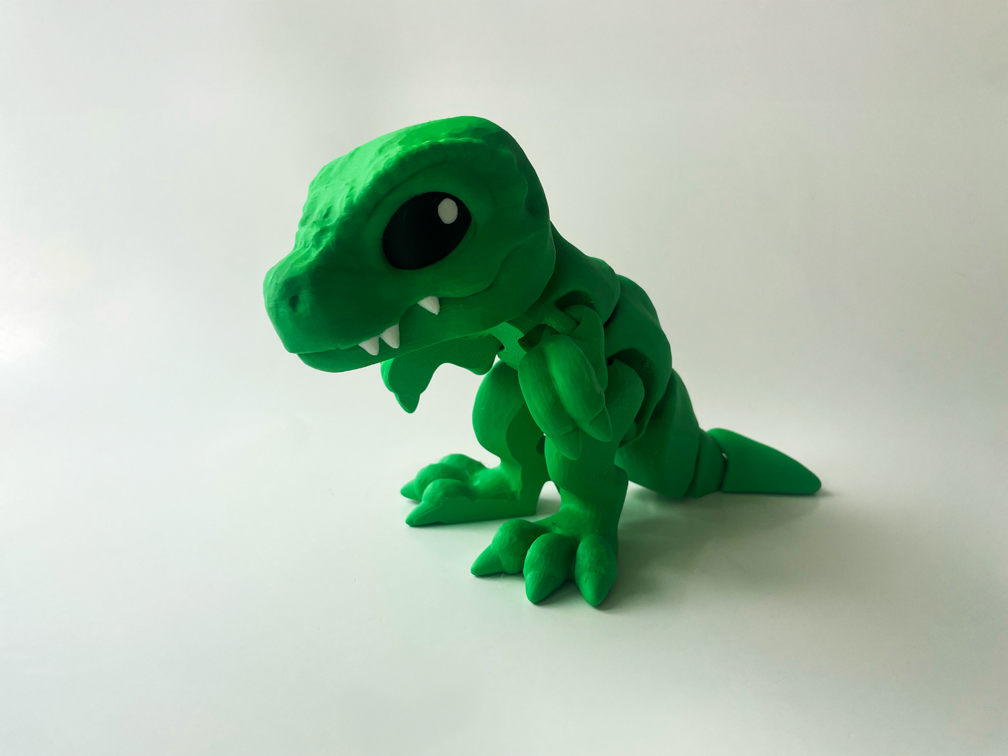 3D Printed Green T-Rex: Posable Dinosaur Toy by Cinderwing3D
