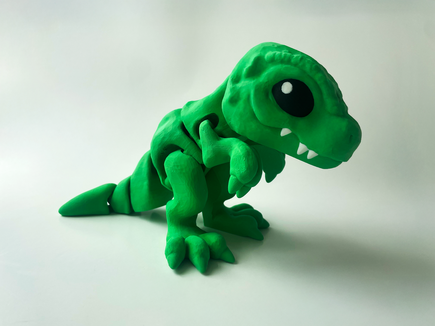 3D Printed Green T-Rex: Posable Dinosaur Toy by Cinderwing3D