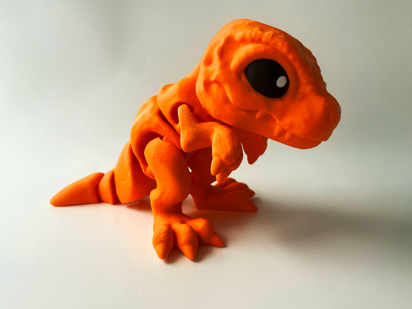 3D Printed Orange T-Rex: Posable Dinosaur Toy by Cinderwing3D