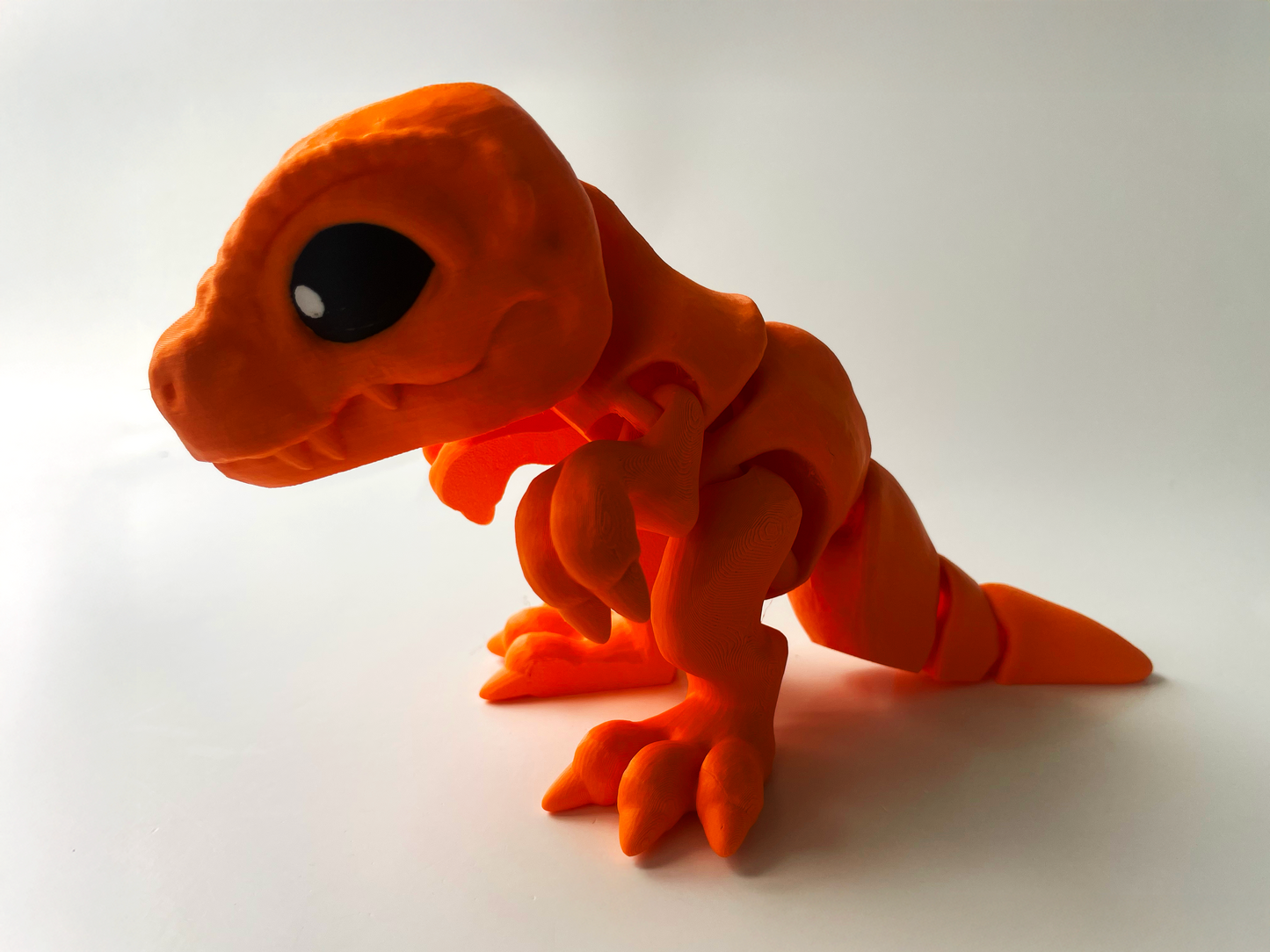 3D Printed Orange T-Rex: Posable Dinosaur Toy by Cinderwing3D