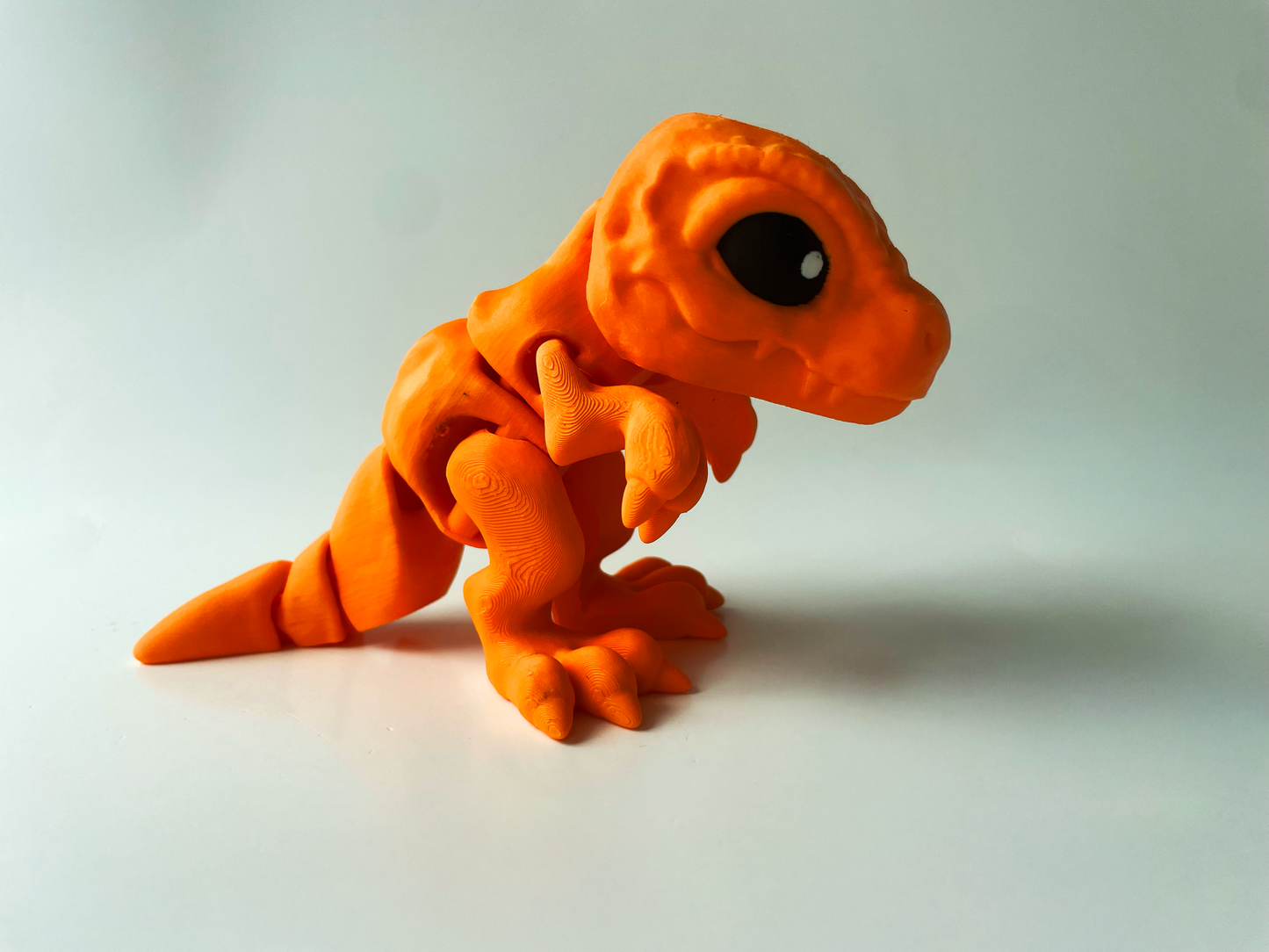 3D Printed Orange T-Rex: Posable Dinosaur Toy by Cinderwing3D